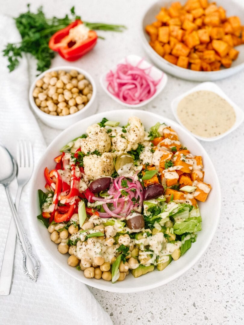 Mediterranean chickpea salad bowl with roasted sweet potatoes